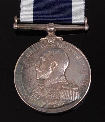 Lot 111 - A George V. Royal Naval Long Service and Good Conduct medal