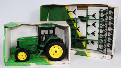 Lot 1212 - An ERTL boxed John Deere large scale tractor...