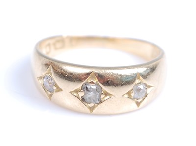 Lot 2216 - An 18ct yellow gold diamond Gypsy style ring,...