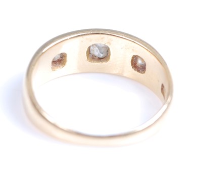 Lot 2216 - An 18ct yellow gold diamond Gypsy style ring,...