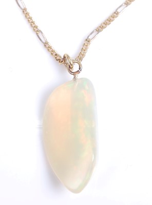 Lot 2043 - An abstract polished opal pendant, dimensions...