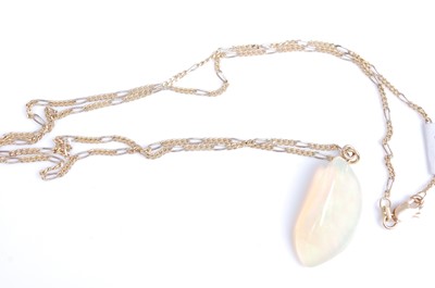 Lot 2043 - An abstract polished opal pendant, dimensions...