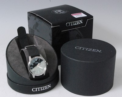 Lot 2023 - A gent's Citizen Eco-drive steel cased quartz...