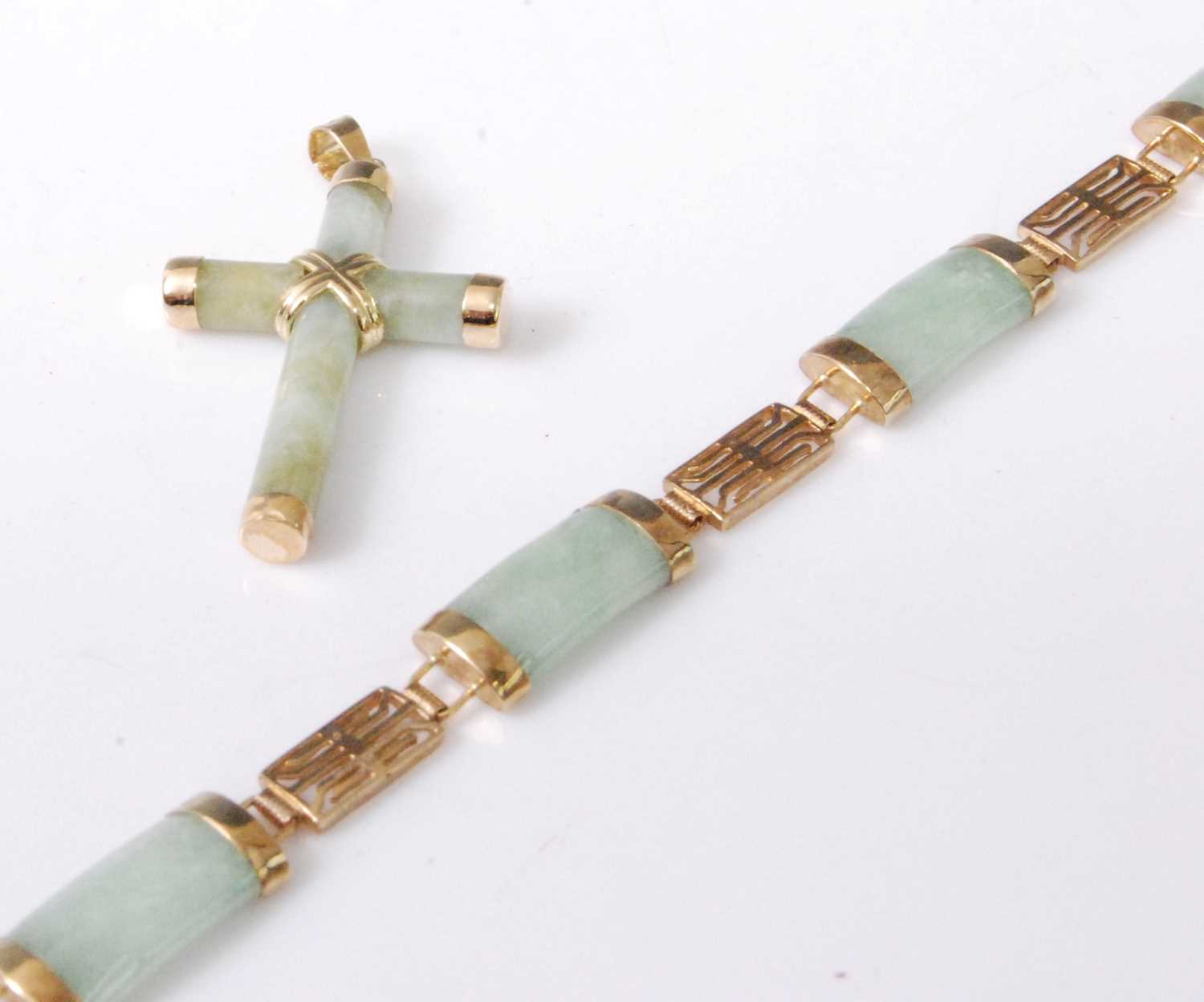 Lot 2039 - A 9ct gold and jadeite sectional link bracelet,...