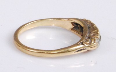 Lot 2056 - An 18ct gold diamond five-stone ring, the...