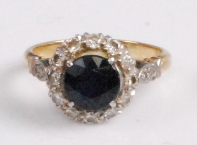 Lot 2085 - An 18ct gold and platinum, sapphire and...