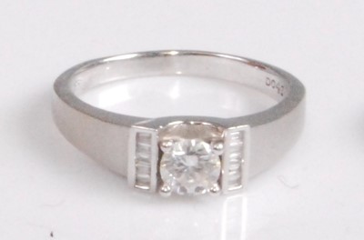 Lot 2086 - A contemporary 18ct white gold diamond ring,...