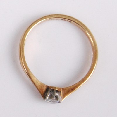 Lot 2116 - An 18ct gold diamond solitaire ring, the claw...
