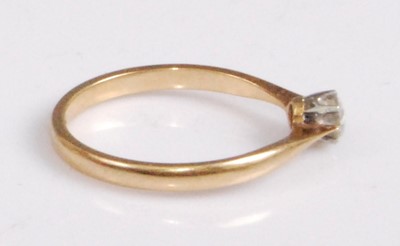 Lot 2116 - An 18ct gold diamond solitaire ring, the claw...