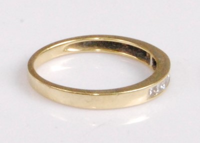Lot 2183 - An 18ct gold diamond half eternity ring,...