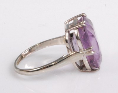 Lot 2100 - A modern 18ct white gold and amethyst set...