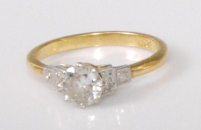 Lot 2177 - An 18ct gold diamond solitaire ring, the claw...
