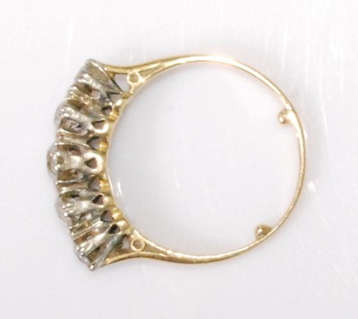Lot 2178 - A yellow metal diamond five-stone ring, the...