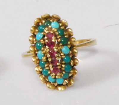 Lot 2189 - An 18ct gold, ruby and turquoise set dress...