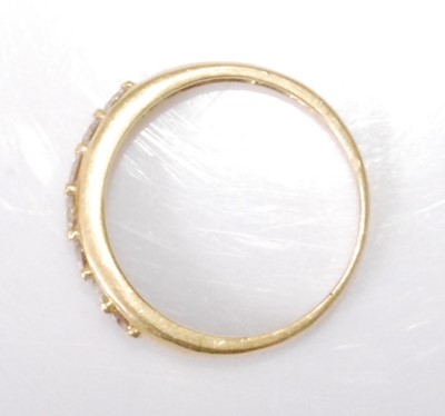 Lot 2230 - An 18ct gold diamond half hoop ring, the seven...