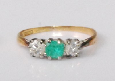 Lot 2244 - An 18ct gold and platinum, emerald and diamond...