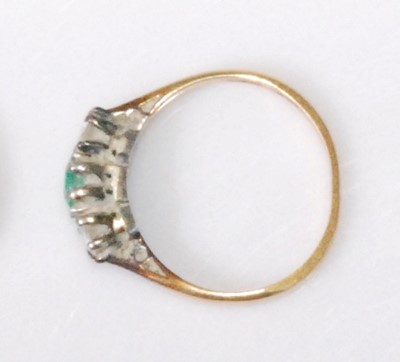 Lot 2244 - An 18ct gold and platinum, emerald and diamond...