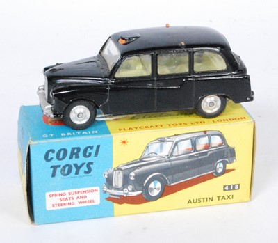 Lot 1705 - A Corgi Toys No.418 Austin Taxi, comprising of...