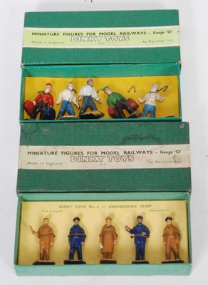 Lot 2037 - A Dinky Toys 0 gauge boxed figure group, to...