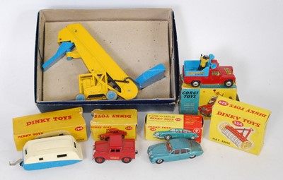 Lot 2038 - A Dinky Toys and Corgi Toys boxed and playworn...