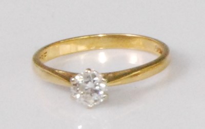 Lot 2258 - A contemporary 18ct gold diamond solitaire...