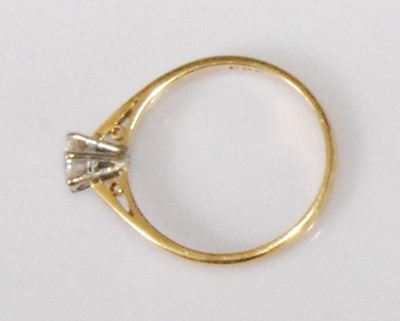 Lot 2258 - A contemporary 18ct gold diamond solitaire...