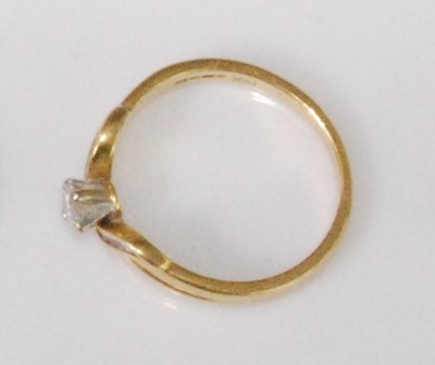 Lot 2262 - A contemporary 18ct gold diamond solitaire...