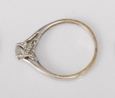 Lot 2265 - An 18ct white gold diamond solitaire ring, the...
