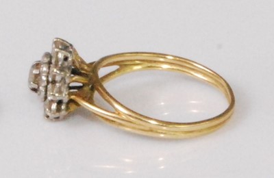 Lot 2266 - A yellow metal diamond flowerhead cluster ring,...