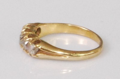 Lot 2267 - An 18ct gold diamond five stone ring, the...