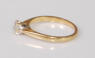 Lot 2268 - A contemporary 18ct gold diamond solitaire...