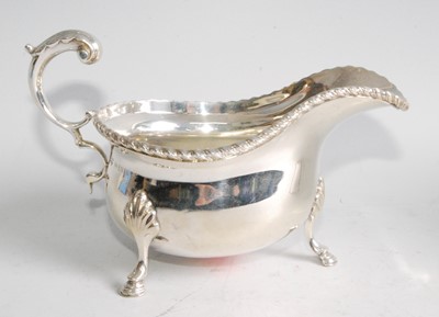 Lot 1095 - A silver sauceboat in the George III style,...