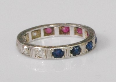 Lot 2278 - A white metal, ruby, diamond and sapphire set '...