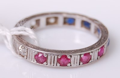 Lot 2278 - A white metal, ruby, diamond and sapphire set '...