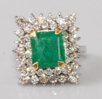 Lot 2279 - A contemporary white metal, emerald and...