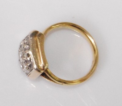 Lot 2280 - An 18ct gold diamond flowerhead cluster ring,...
