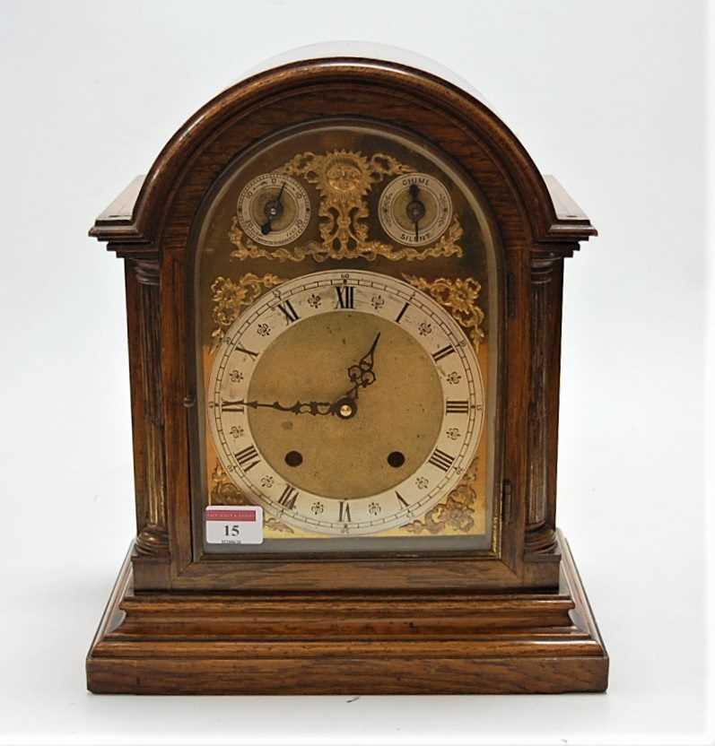 Lot 15 - An early 20th century oak cased dome topped...