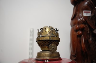 Lot 26 - A late Victorian cast iron pedestal oil lamp,...