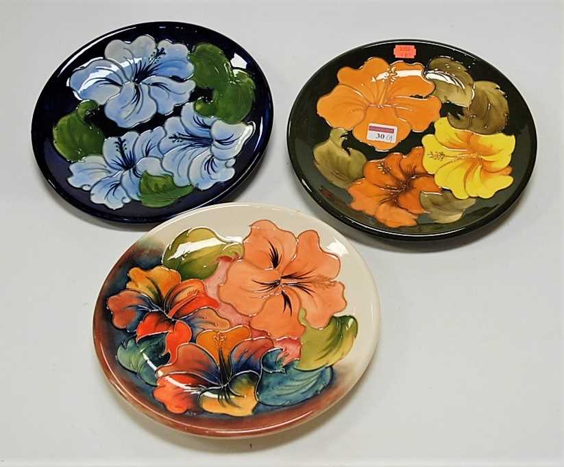Lot 30 - A modern Moorcroft plate, decorated in the...