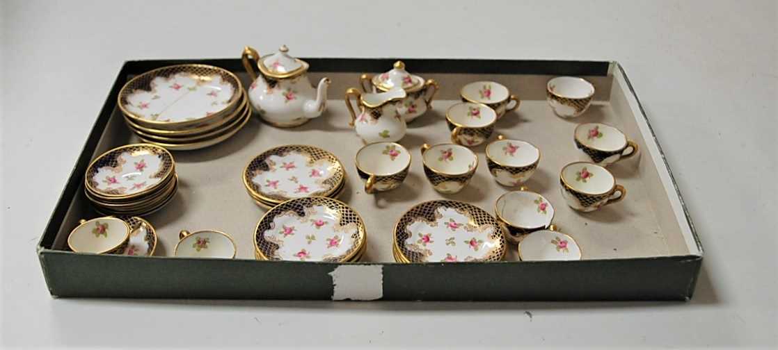 Lot 208 - A Crown Staffordshire porcelain dolls part tea...