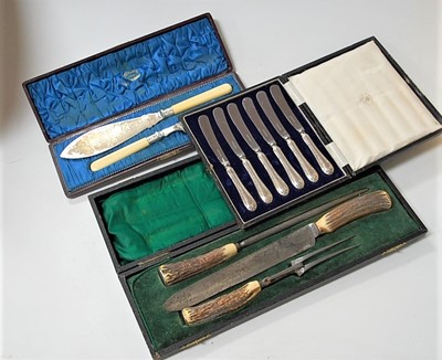 Lot 231 - A cased pair of silver plated and faux ivory...