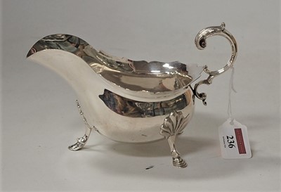Lot 236 - A Walker & Hall silver sauceboat, in the...