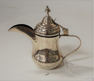 Lot 237 - A Middle Eastern white metal miniature coffee...