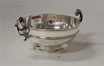 Lot 251 - A late Victorian silver twin handled footed...