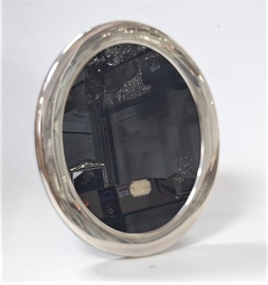 Lot 260 - A modern plain silver easel photograph frame,...