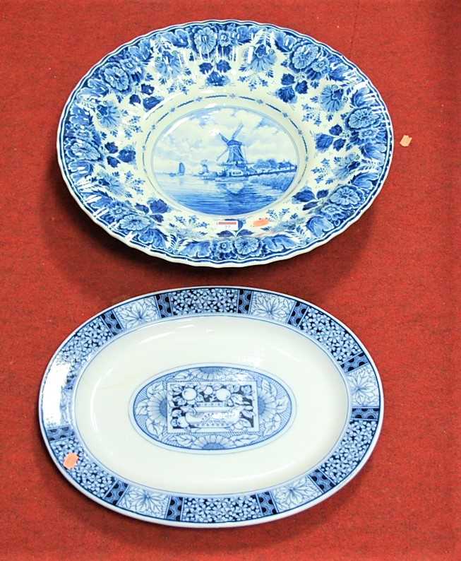 Lot 77 - A large modern Dutch Delft charger, of...