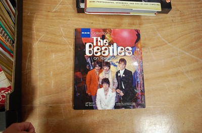 Lot 90 - A box of assorted Beatles related books, to...