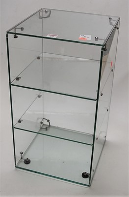 Lot 140 - A three-tier glass display case, h.58cm
