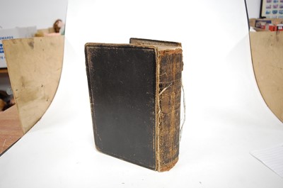 Lot 147 - Two leather bound Bibles