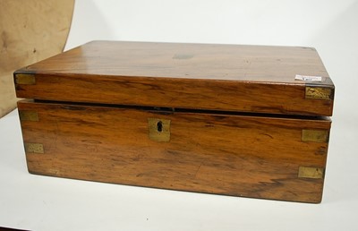 Lot 160 - A Victorian rosewood and brass bound writing...